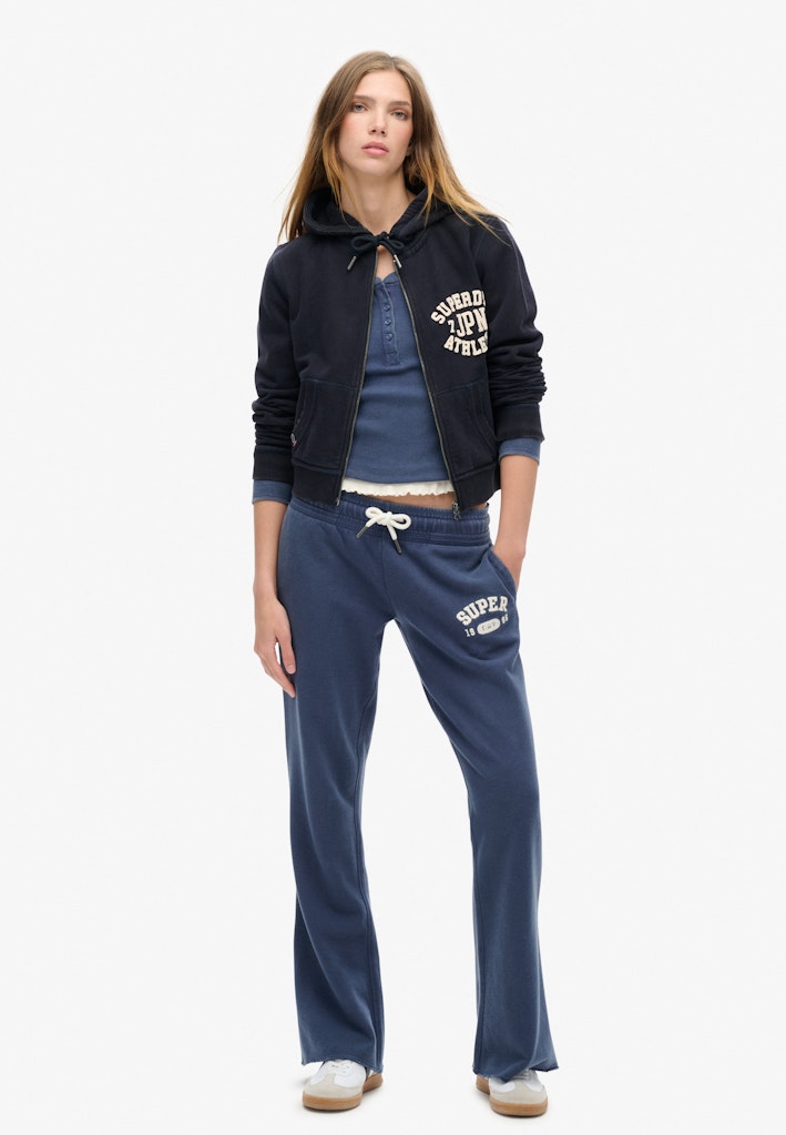 Joggers Acampanados de Talle Bajo Athletic Essentials [fc:image_id:672a2318f9502cea0c078f43] [fc:hash:98c07359ffae9057f4c9cb07c9a9fdb7025bc915]