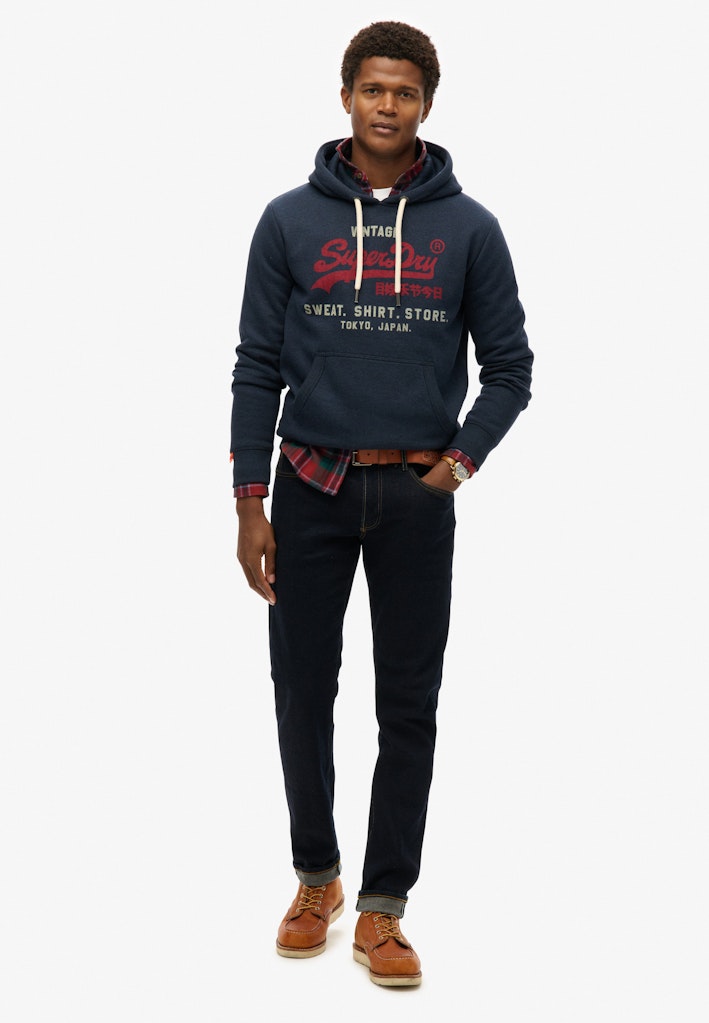 Sudadera de corte relajado con capucha y logo Vintage Heritage [fc:image_id:672c59685aeef6b0c3512c2a] [fc:hash:9a2567c30873e2962247db9c9d20e14c3f89ae88]