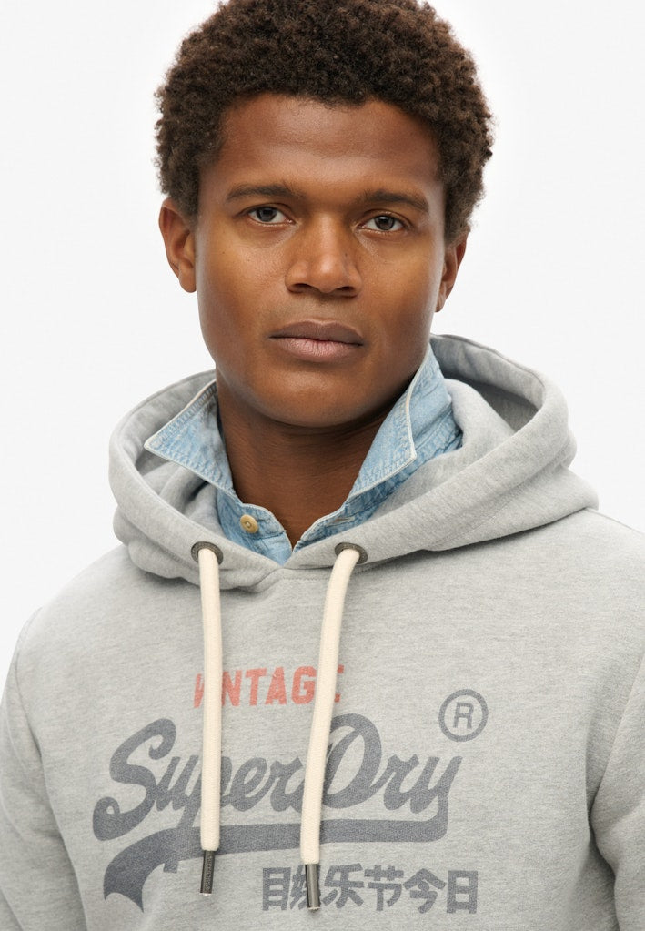 Sudadera de corte relajado con capucha y logo Vintage Heritage [fc:image_id:67f637f0340df1701aa327b1] [fc:hash:43cacbb8b92cf007dd8349db28c675e1c9620fdf]