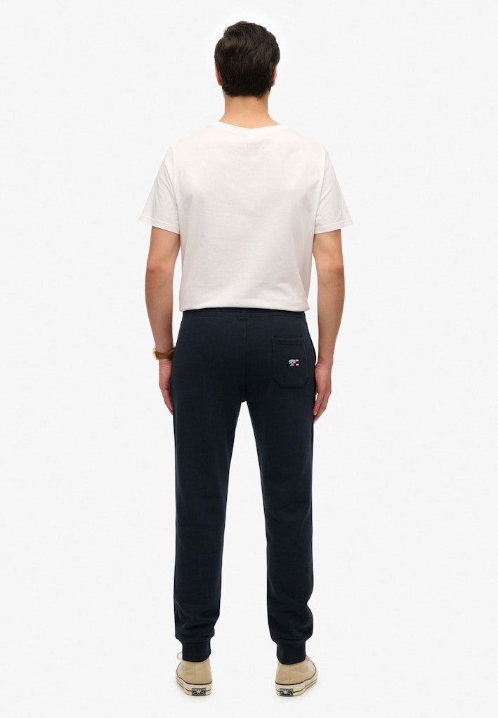 Joggers Essential Logo Semi Cepillados [fc:image_id:6897cc458012e4b9f101d656] [fc:hash:b1fa6bbb8670001c5dd80d95abd75ecea6192b49]