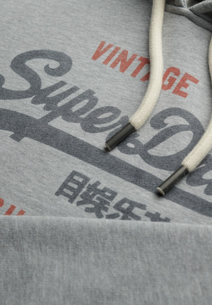 Sudadera de corte relajado con capucha y logo Vintage Heritage [fc:image_id:69052e846be09c3881649d9f] [fc:hash:f5ca587c075ae4a7cc62b31418c0eb0e105cda5a]