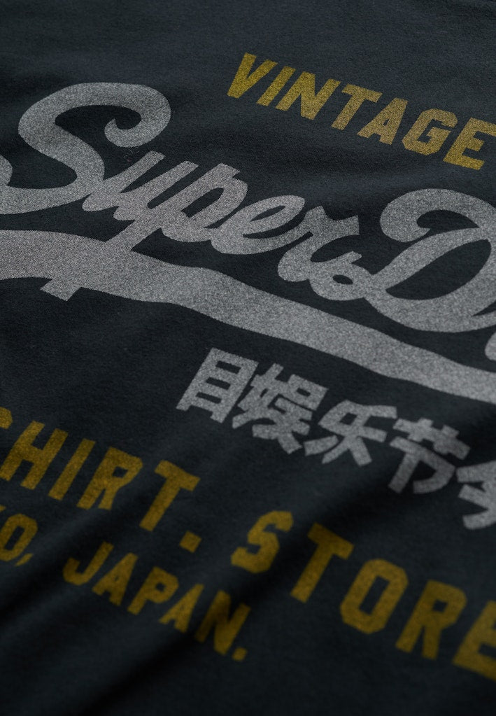 Camiseta de corte relajado Heritage con logo Vintage [fc:image_id:69052e8555f8e7fe691163c3] [fc:hash:19573c5d6d58706c525459252060adba260b5384]