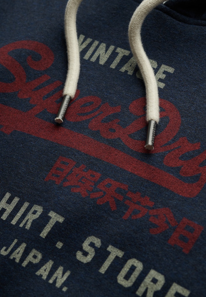 Sudadera de corte relajado con capucha y logo Vintage Heritage [fc:image_id:69052e92f8b2d60a56fd44e7] [fc:hash:38ce8b8433ec96d6ee910f86e09989b5acf71ed2]