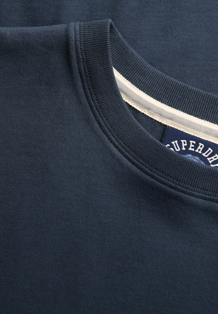 Camiseta de corte holgado con logotipo Essential [fc:image_id:69c58b23600c02fea355a4c7] [fc:hash:258a683608a63b25db06b32e73d0bf16bc7ebace]