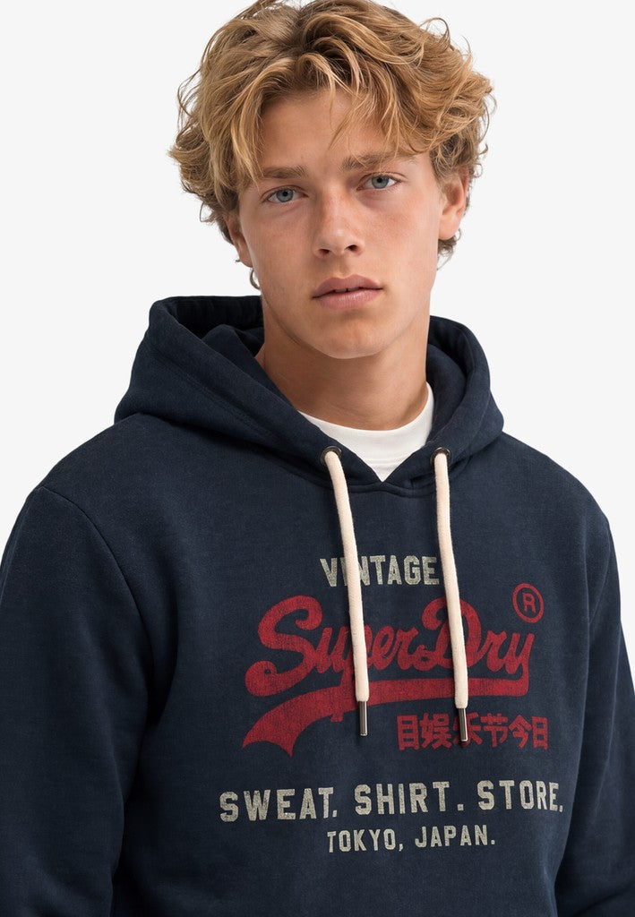 Sudadera de corte relajado con capucha y logo Vintage Heritage [fc:image_id:6a612f691f00a4efb4127fa9] [fc:hash:b1def9936c63200be6f94b28959d90a41822c008]