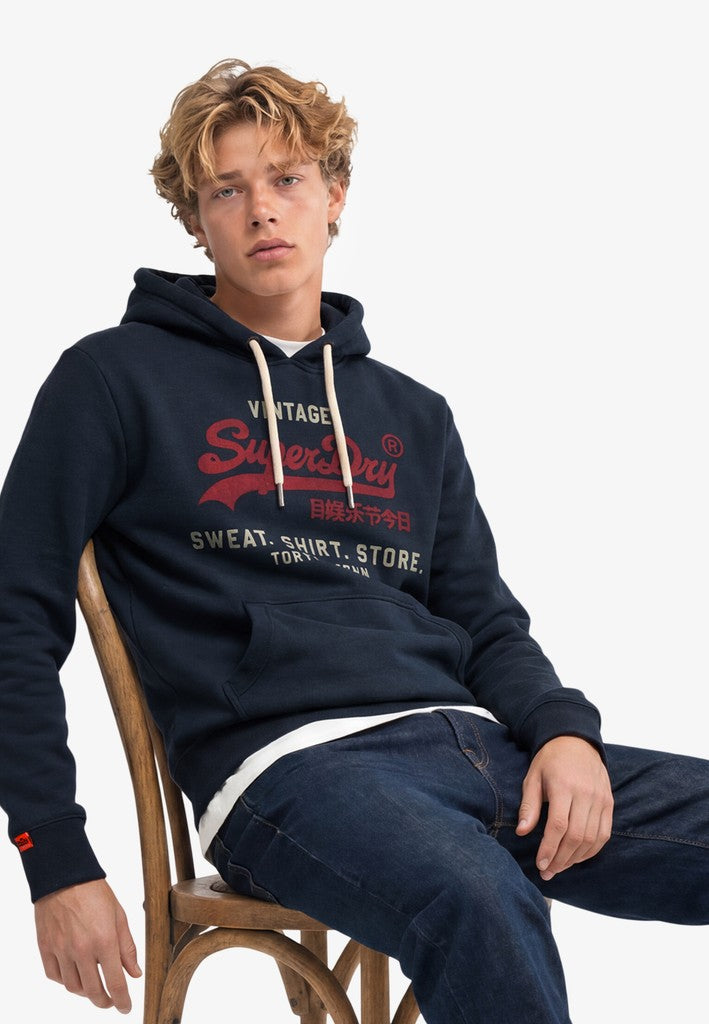 Sudadera de corte relajado con capucha y logo Vintage Heritage [fc:image_id:6a612f691f00a4efb4127fab] [fc:hash:a68fe138a39f4257ccc598f9ba4dc4134977fea5]