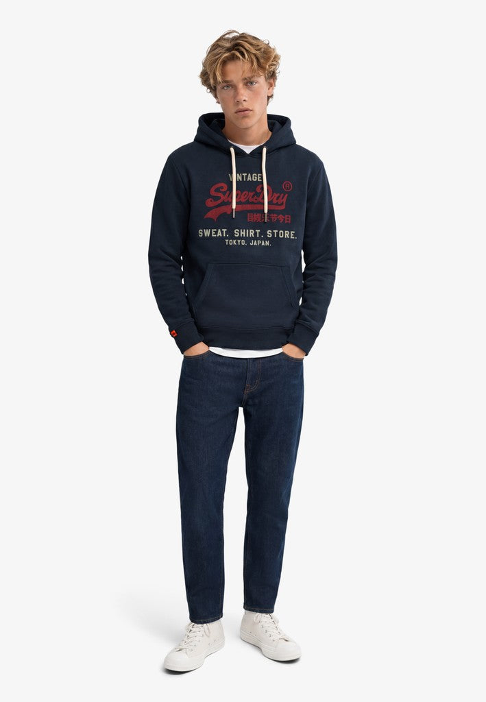 Sudadera de corte relajado con capucha y logo Vintage Heritage [fc:image_id:6a612f691f00a4efb4127fae] [fc:hash:8454d63e03c1589b113a0e2620af50ff2de388c3]
